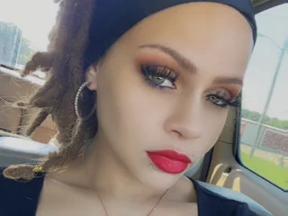 streamate foxxyphoenixx webcam profile pic via elivecams.com