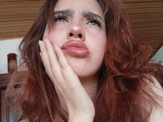 streamate elodie_rouge webcam profile pic via sexcam-girls.com